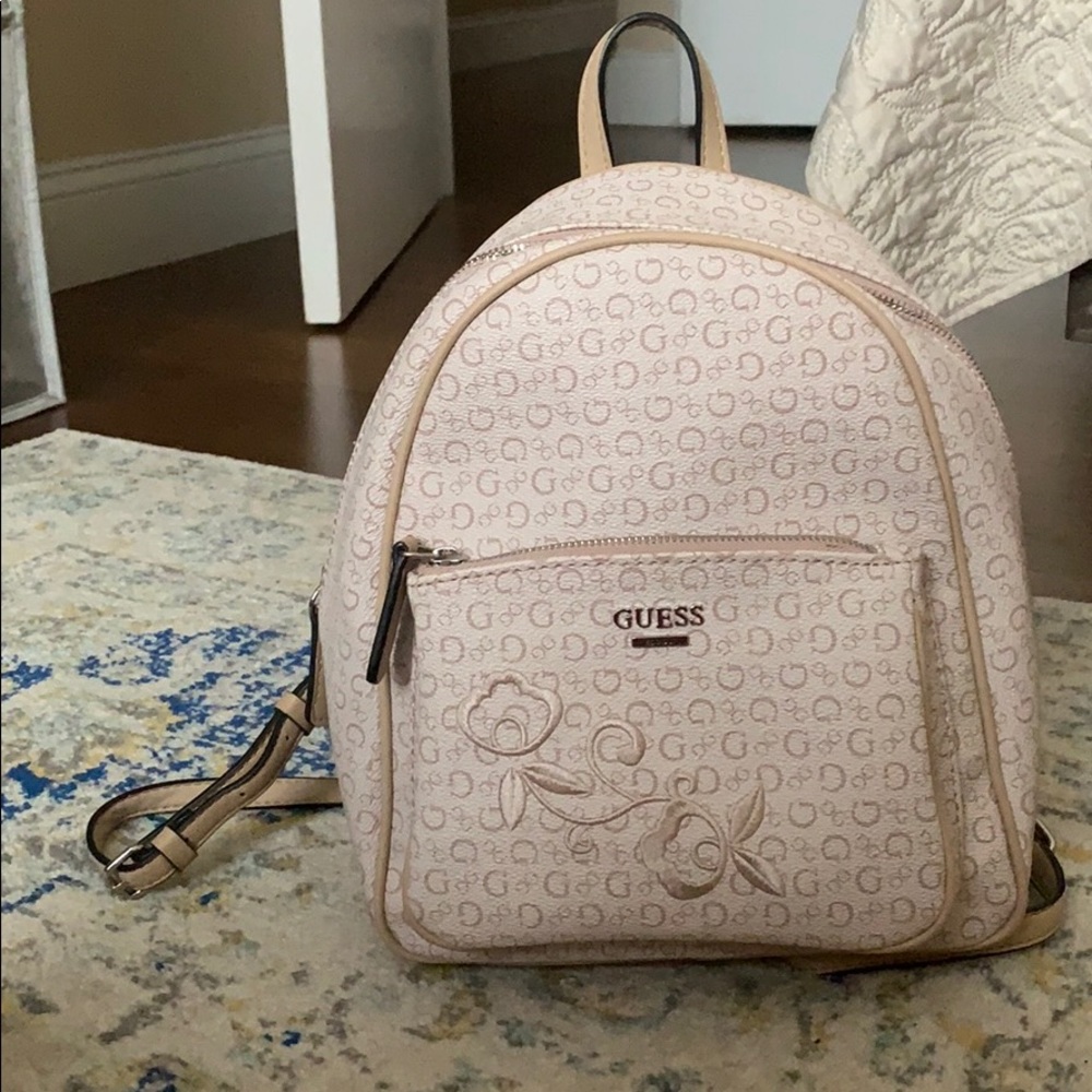 Guess small backpack with flower on front pocket